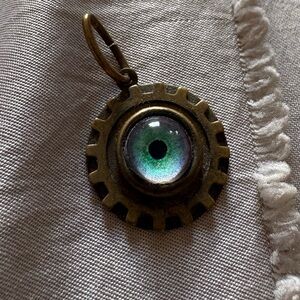 Steampunk Gear Pendant with Green Evil Eye